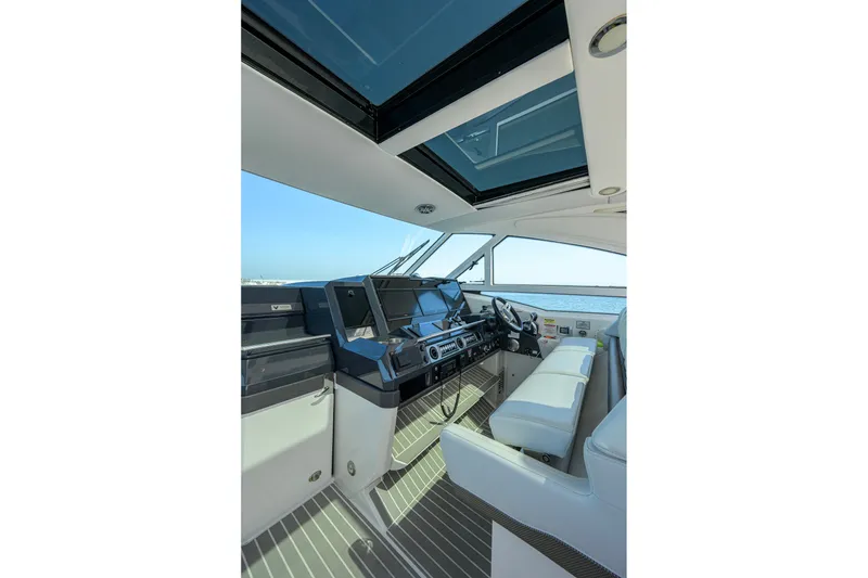 Slide: The Image of Interior of 2019 Formula 430 Super Sport Crossover yacht with modern helm and seating. - 34