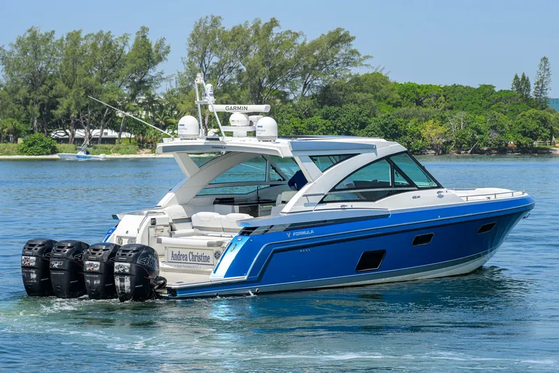 Slide: The Image of 2019 Formula 430 Super Sport Crossover boat cruising on a sunny day. - 65
