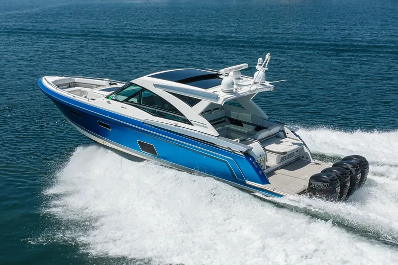 Slide: The Image of 2019 Formula 430 Super Sport Crossover cruising on open water, showcasing sleek design and powerful engines. - 75