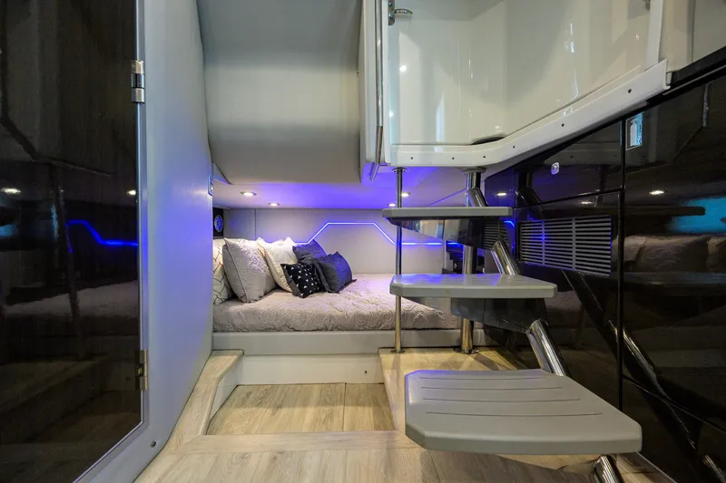 Slide: The Image of Luxurious interior of 2019 Formula 430 Super Sport Crossover with modern lighting and cozy bedding. - 78