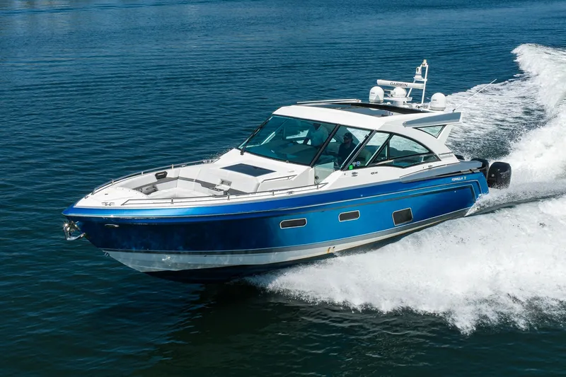 Slide: The Image of 2019 Formula 430 Super Sport Crossover cruising on open water. - 72
