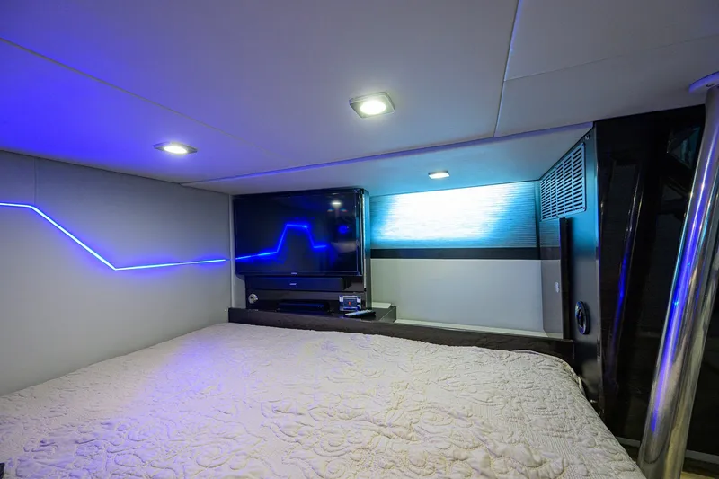 Slide: The Image of Luxurious interior of 2019 Formula 430 Super Sport Crossover with ambient lighting and TV. - 90