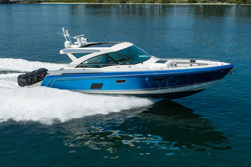 Slide: The Image of 2019 Formula 430 Super Sport Crossover cruising on clear blue water. - 68