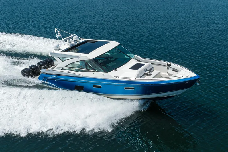 Slide: The Image of 2019 Formula 430 Super Sport Crossover cruising on open water. - 69