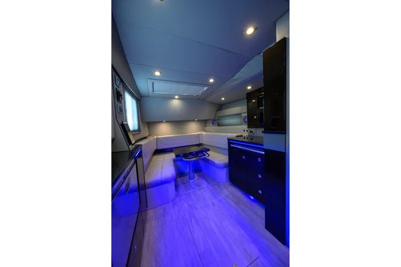 Slide: The Image of Luxurious interior of 2019 Formula 430 Super Sport Crossover with ambient blue lighting. - 87