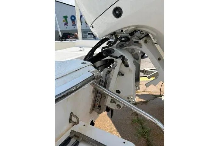 Slide: The Image of 2011 Carolina Skiff JVX18CC boat motor and transom detail in outdoor setting. - 6