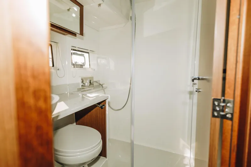 Slide: The Image of Modern bathroom interior of 2026 Beneteau Antares 12 Fly yacht, featuring sleek design and fixtures. - 20