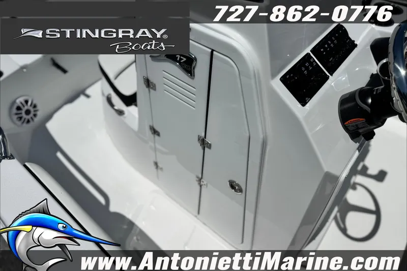 Slide: The Image of Stingray 17 CC boat interior, featuring control panel and storage, 2027 model. - 17