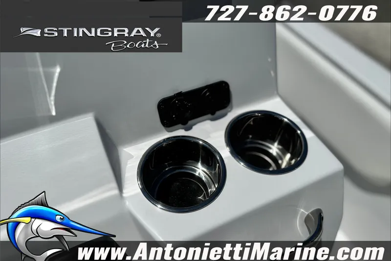 Slide: The Image of Cup holders on a 2027 Stingray 17 CC boat, featuring Antonietti Marine branding. - 21