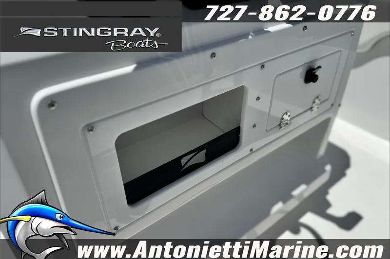 Slide: The Image of 2027 Stingray 17 CC boat console with storage compartment, featuring Antonietti Marine branding. - 23
