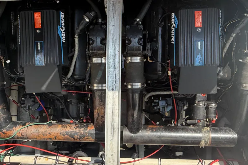 Slide: The Image of Engine compartment of a 1989 Sea Ray 340 Sundancer with twin MerCruiser engines. - 33
