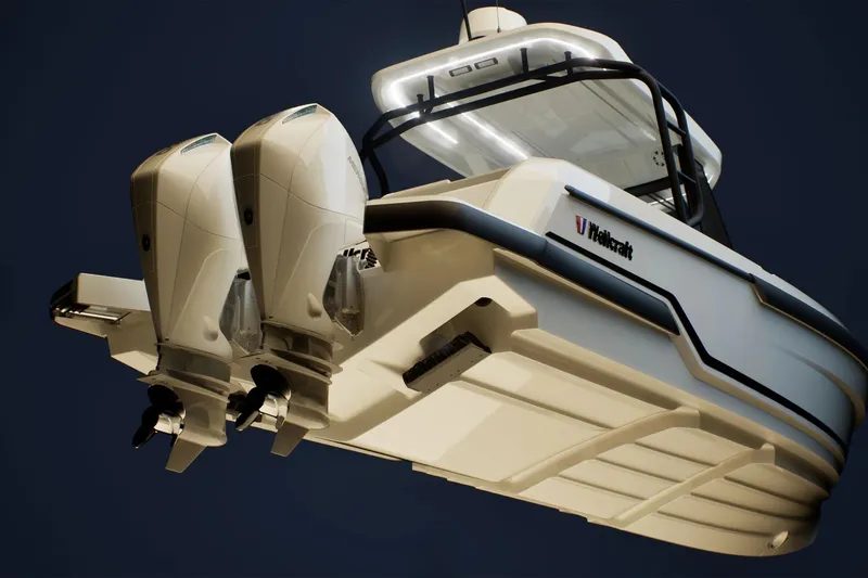 Slide: The Image of 2026 Wellcraft 28 T-Top boat with dual outboard engines, viewed from below. - 24