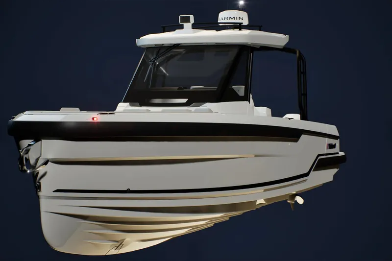 Slide: The Image of 2026 Wellcraft 28 T-Top boat with sleek design and modern features. - 22