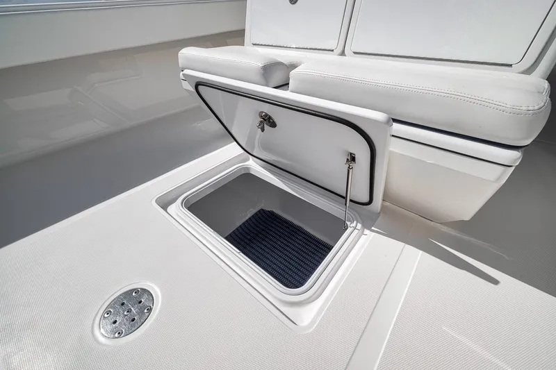 Slide: The Image of Open storage compartment on 2016 Bahama 41 boat deck. - 15