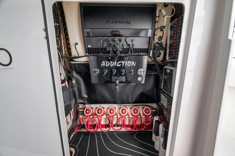 Slide: The Image of Electrical panel of a 2016 Bahama 41 boat with Garmin equipment. - 27