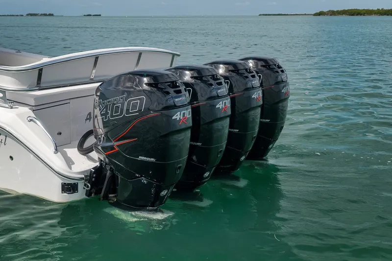 Slide: The Image of 2016 Bahama 41 boat with four Mercury Racing 400R outboard engines on water. - 36