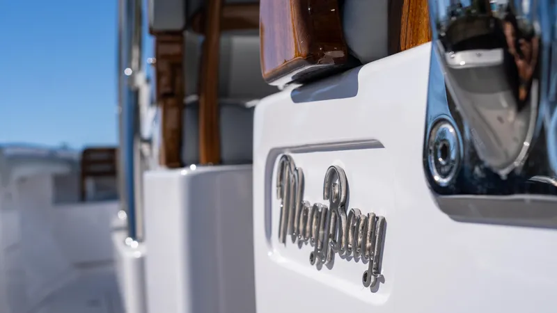 Slide: The Image of 2026 Mag Bay 43 CC boat with polished logo detail. - 18