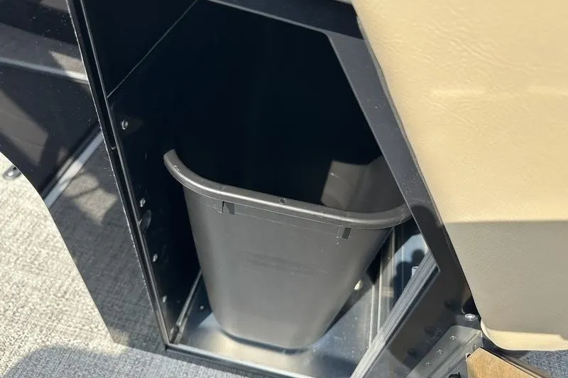 Slide: The Image of Trash bin inside Flamingo Rove 24' 2026 model compartment, showcasing interior storage. - 49