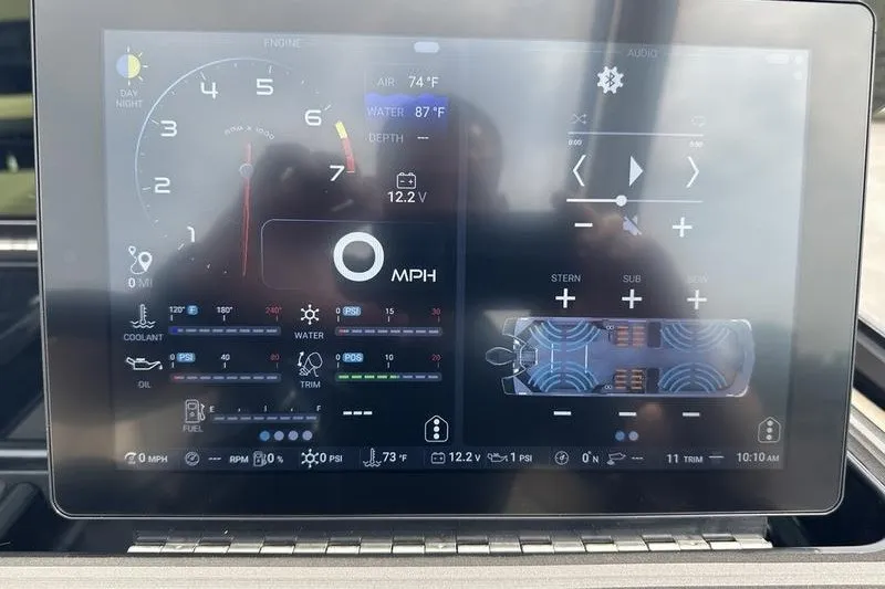 Slide: The Image of Dashboard display of 2026 Flamingo Rove 24' showing engine and audio controls. - 30