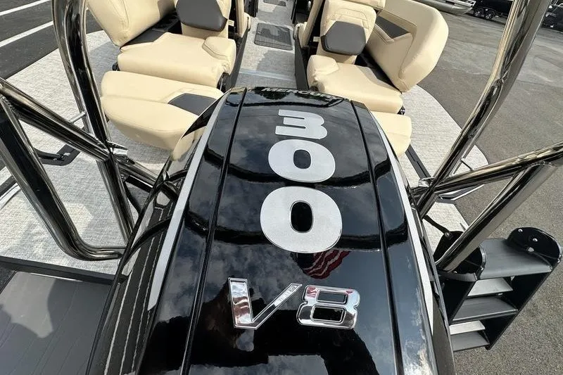 Slide: The Image of Powerful Mercury 300 V8 engine on 2026 Flamingo Rove 24' boat, featuring luxurious seating. - 41