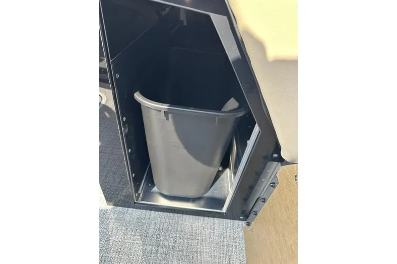 Slide: The Image of Built-in trash bin in 2026 Flamingo Rove 24' vehicle interior. - 19