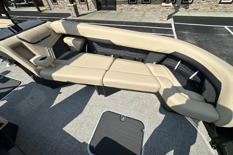 Slide: The Image of Luxurious seating on 2026 Flamingo Rove 24' boat, featuring beige upholstery and modern design. - 15