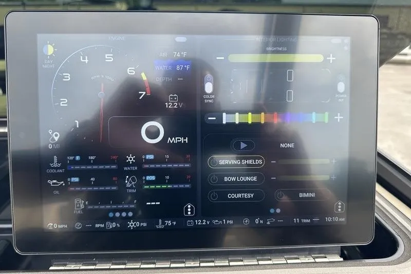 Slide: The Image of Dashboard display of a 2026 Flamingo Rove 24', showing engine and lighting controls. - 31