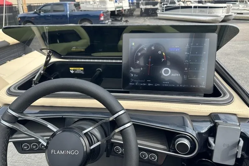Slide: The Image of Dashboard of a 2026 Flamingo Rove 24' with digital display and steering wheel. - 23
