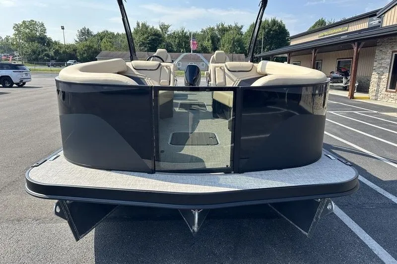 Slide: The Image of 2026 Flamingo Rove 24' pontoon boat, rear view in parking lot. - 36