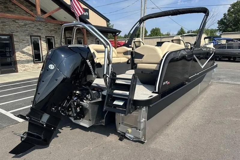 Slide: The Image of 2026 Flamingo Rove 24' pontoon boat with Mercury outboard engine, parked outdoors. - 28