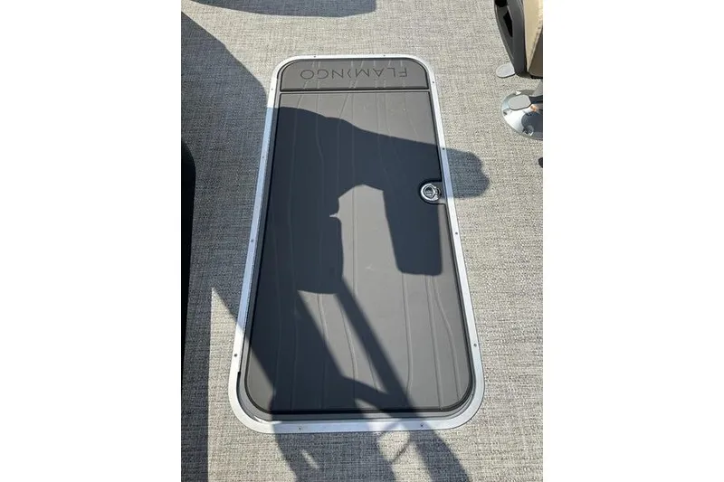 Slide: The Image of Hatch cover on 2026 Flamingo Rove 24' boat, featuring sleek design and durable material. - 44