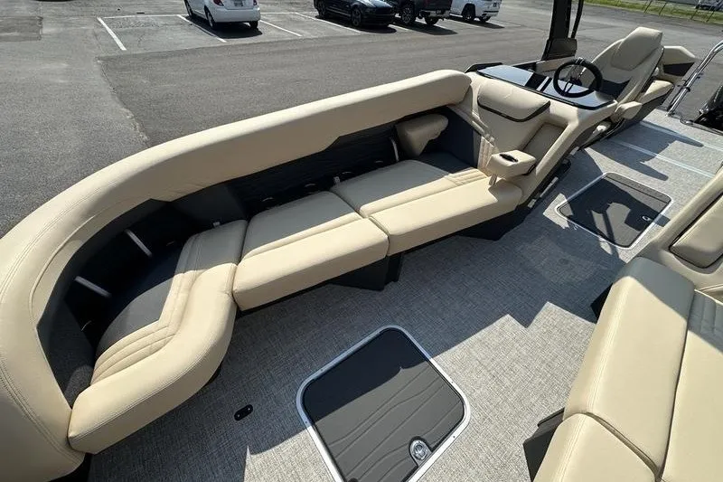 Slide: The Image of Luxurious interior of 2026 Flamingo Rove 24' boat with beige seating. - 14