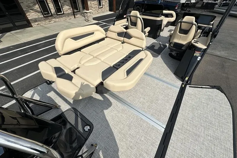 Slide: The Image of 2026 Flamingo Rove 24' boat interior with beige seating and modern design. - 47