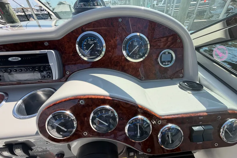 Slide: The Image of Dashboard of a 2004 Formula 260 Bowrider boat with gauges and controls. - 17