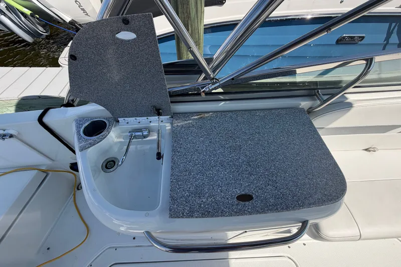 Slide: The Image of 2004 Formula 260 Bowrider boat interior with sink and countertop. - 29