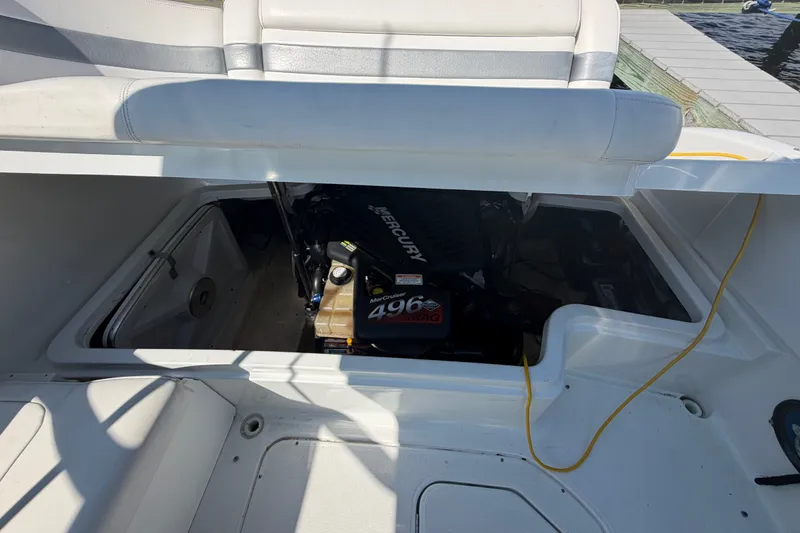 Slide: The Image of 2004 Formula 260 Bowrider engine compartment with MerCruiser 496 MAG engine visible. - 33