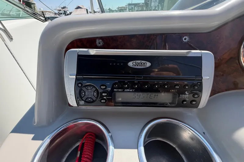 Slide: The Image of Clarion stereo system on 2004 Formula 260 Bowrider dashboard. - 18