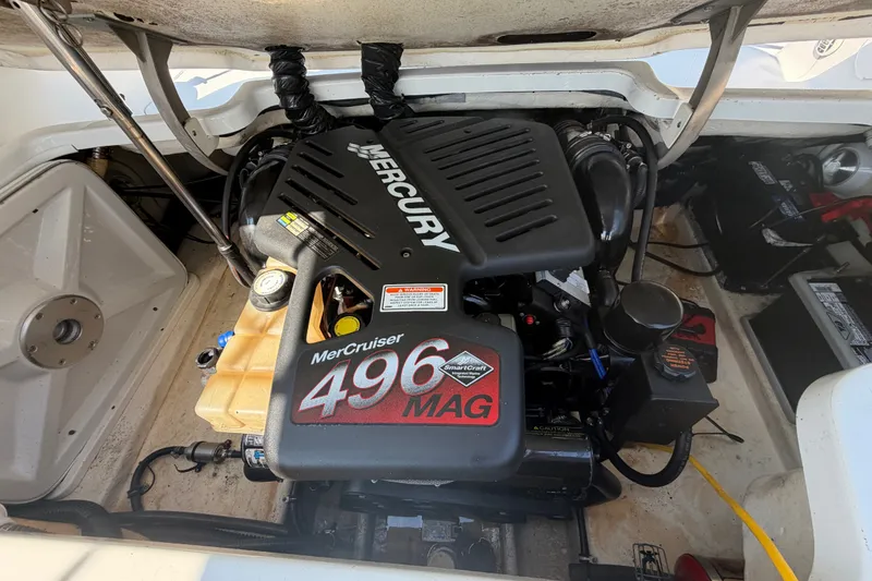 Slide: The Image of 2004 Formula 260 Bowrider engine compartment with MerCruiser 496 MAG engine. - 27