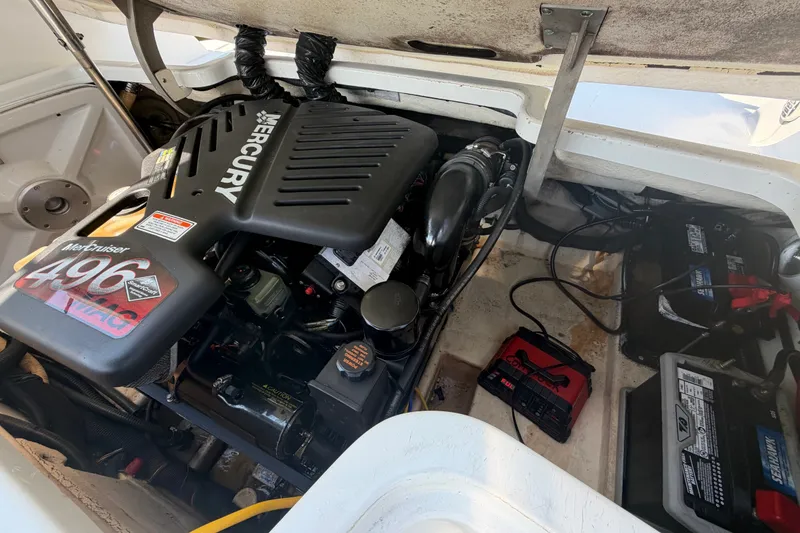 Slide: The Image of 2004 Formula 260 Bowrider engine compartment with MerCruiser 496 MAG engine. - 35