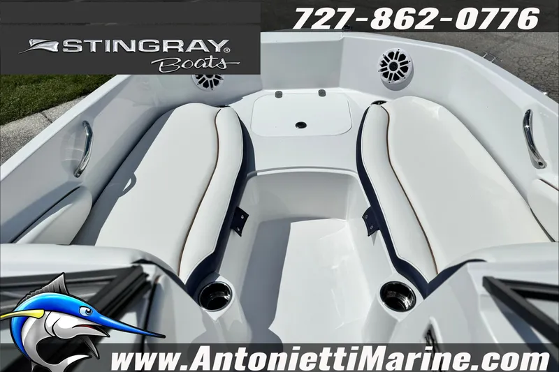 Slide: The Image of 2027 Stingray 19 DC boat interior with seating, cup holders, and speakers. Contact Antonietti Marine. - 13