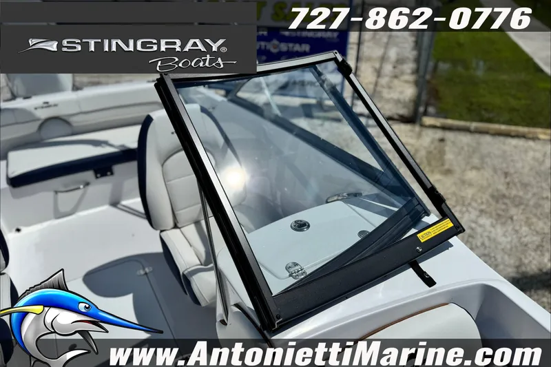 Slide: The Image of 2027 Stingray 19 DC boat interior with windshield, showcased by Antonietti Marine. - 17