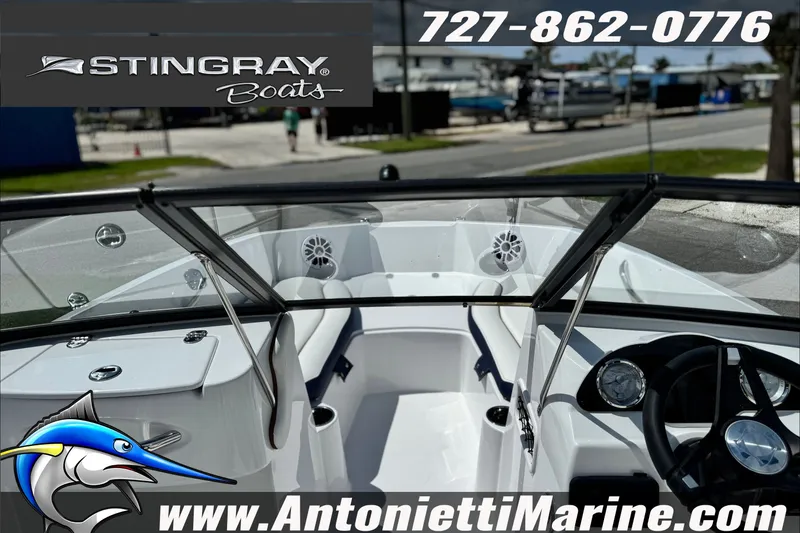 Slide: The Image of Interior view of 2027 Stingray 19 DC boat at Antonietti Marine dealership. - 18