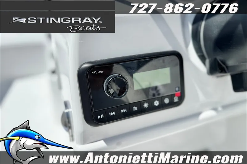 Slide: The Image of Stingray 19 DC 2027 boat dashboard with Modus control panel, Antonietti Marine branding. - 23