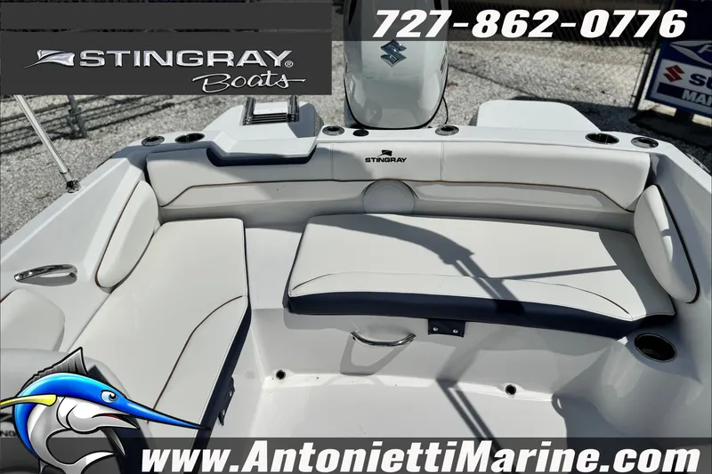 Slide: The Image of 2027 Stingray 19 DC boat interior with seating, logo, and contact details for Antonietti Marine. - 30