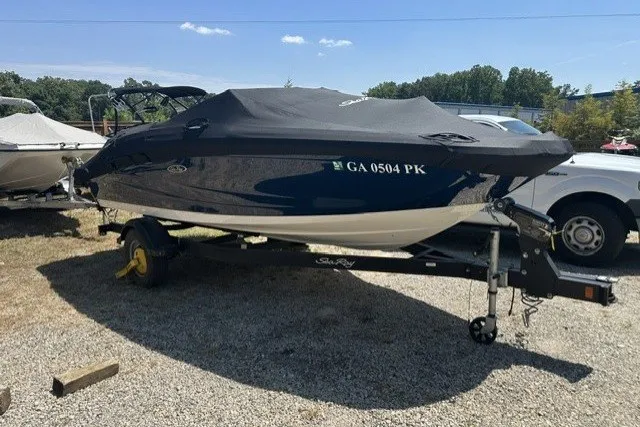 Slide: The Image of 2018 Sea Ray SPX 190 boat on trailer, covered, parked outdoors. - 15