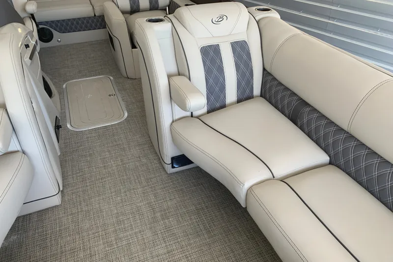 Slide: The Image of Luxurious interior of 2022 Barletta LUSSO 25U pontoon boat with plush seating. - 17