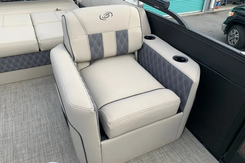 Slide: The Image of Luxurious seating on 2022 Barletta LUSSO 25U pontoon boat with cup holders. - 31