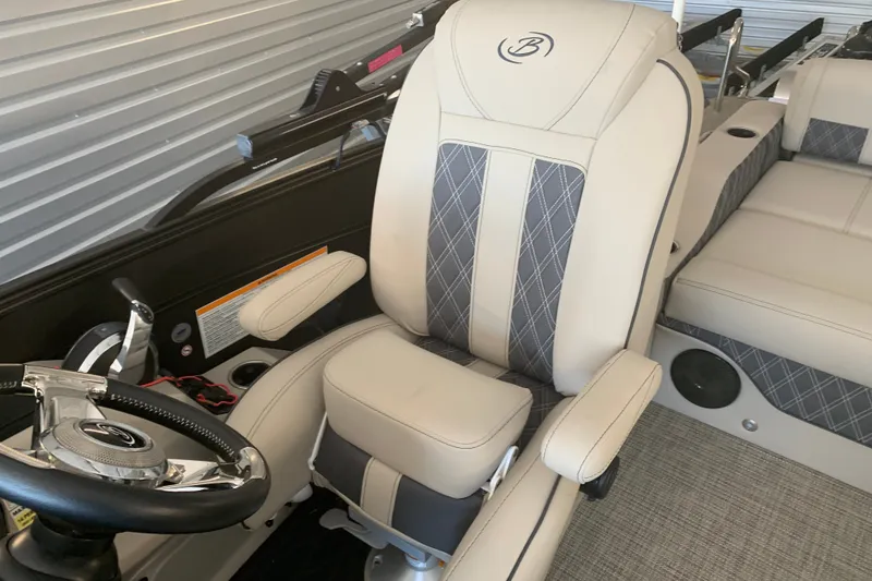 Slide: The Image of Captain's chair in 2022 Barletta LUSSO 25U pontoon boat interior. - 11