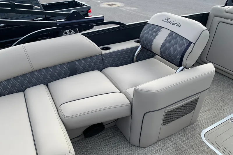 Slide: The Image of Luxurious seating on 2022 Barletta LUSSO 25U pontoon boat, featuring elegant upholstery. - 30