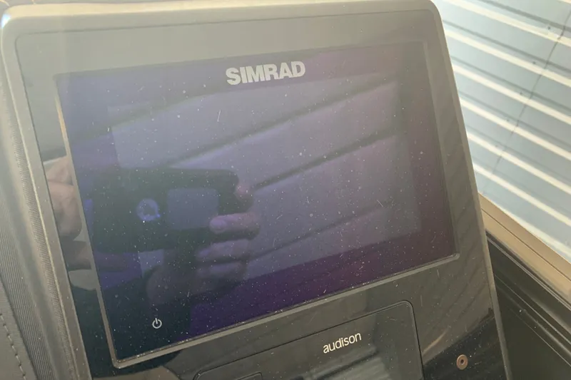 Slide: The Image of Simrad display screen on 2022 Barletta LUSSO 25U boat dashboard. - 20
